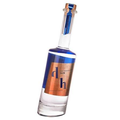 The Domestic Gin bottle with blue and copper label